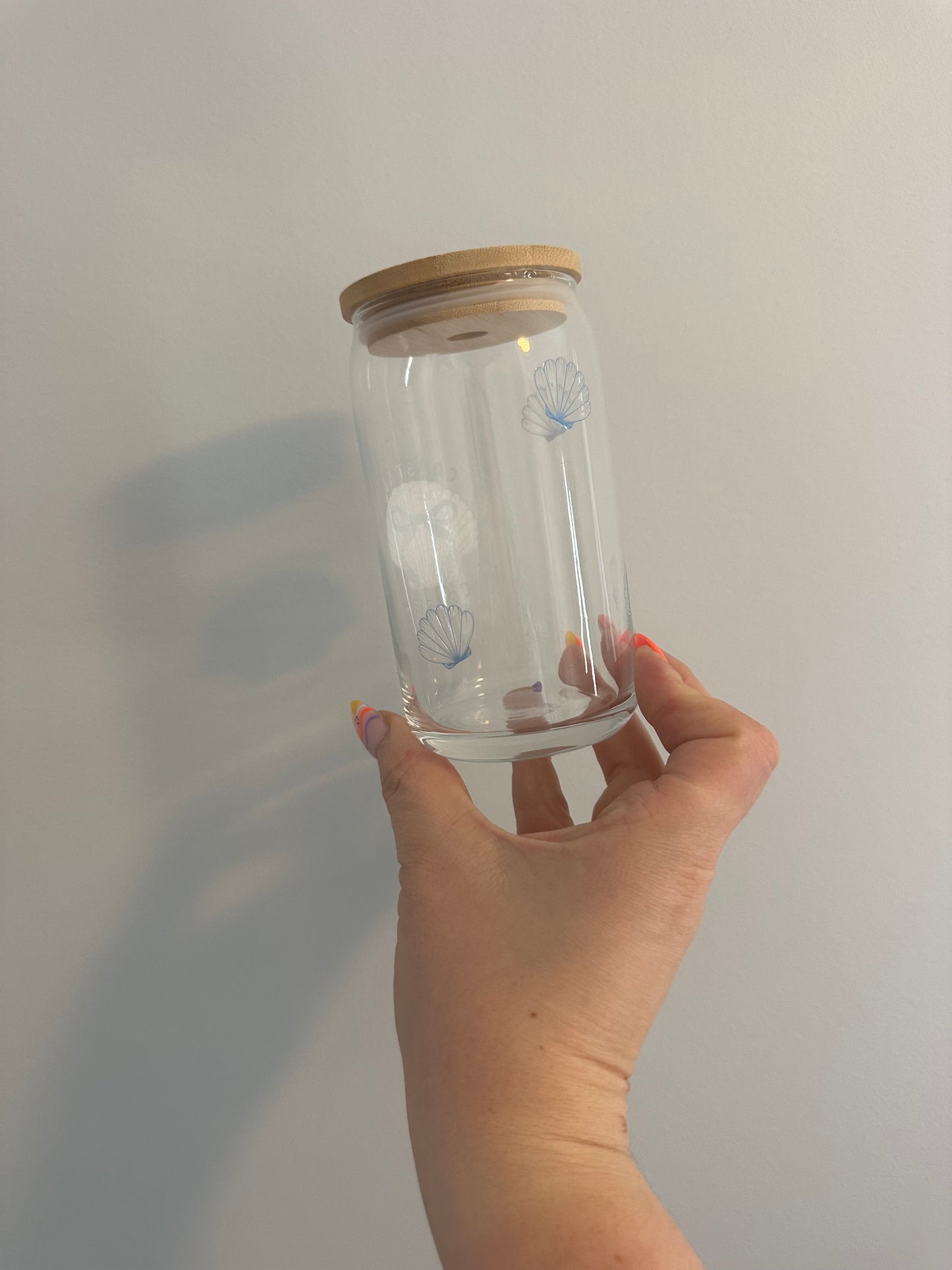 Blue bow/shell glass cup